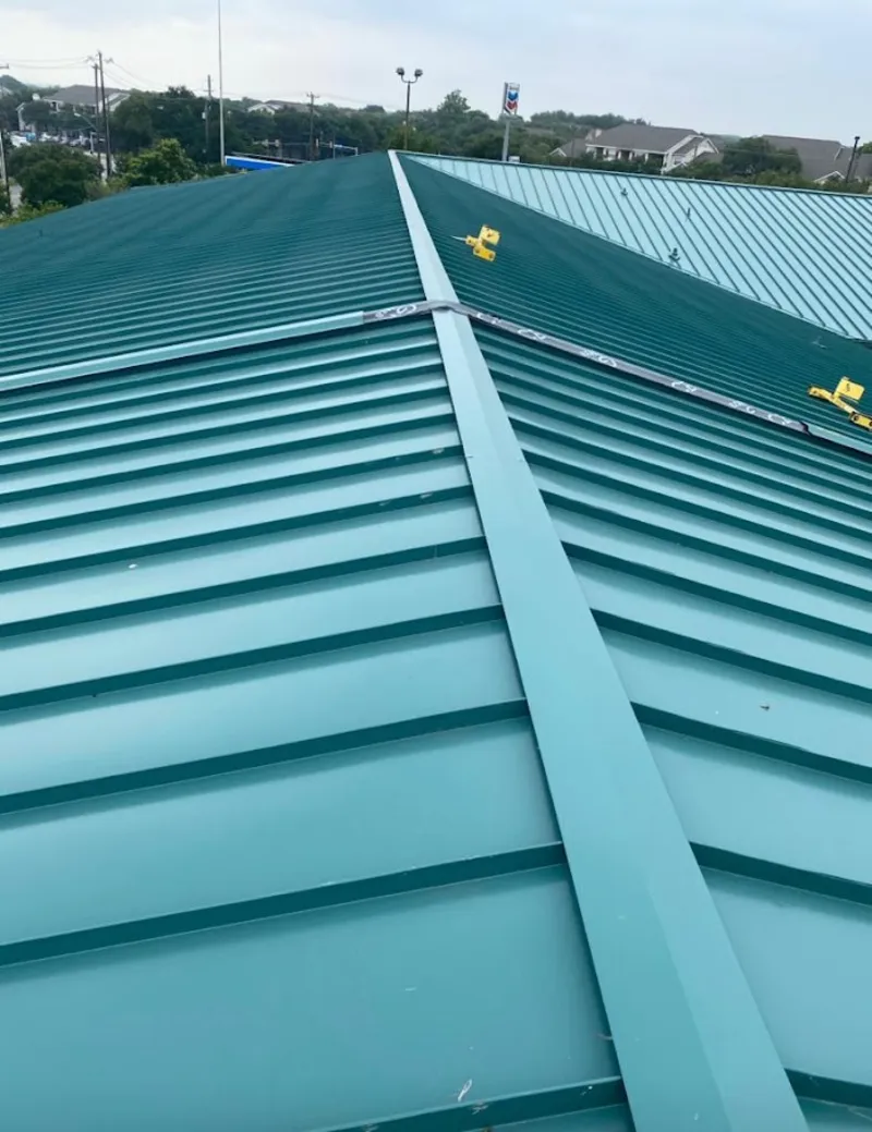 Green commercial metal roof ridge and valley for Metal Roof Repair in Darnestown